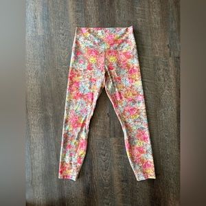 Womens Lululemon size 8 floral high waisted leggings.